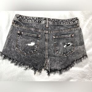 Women’s black distressed short shorts. Size 6/28